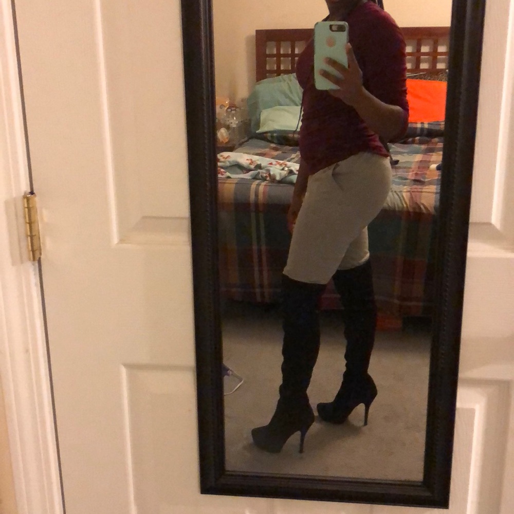 Black 5 inch suede thigh high boots.